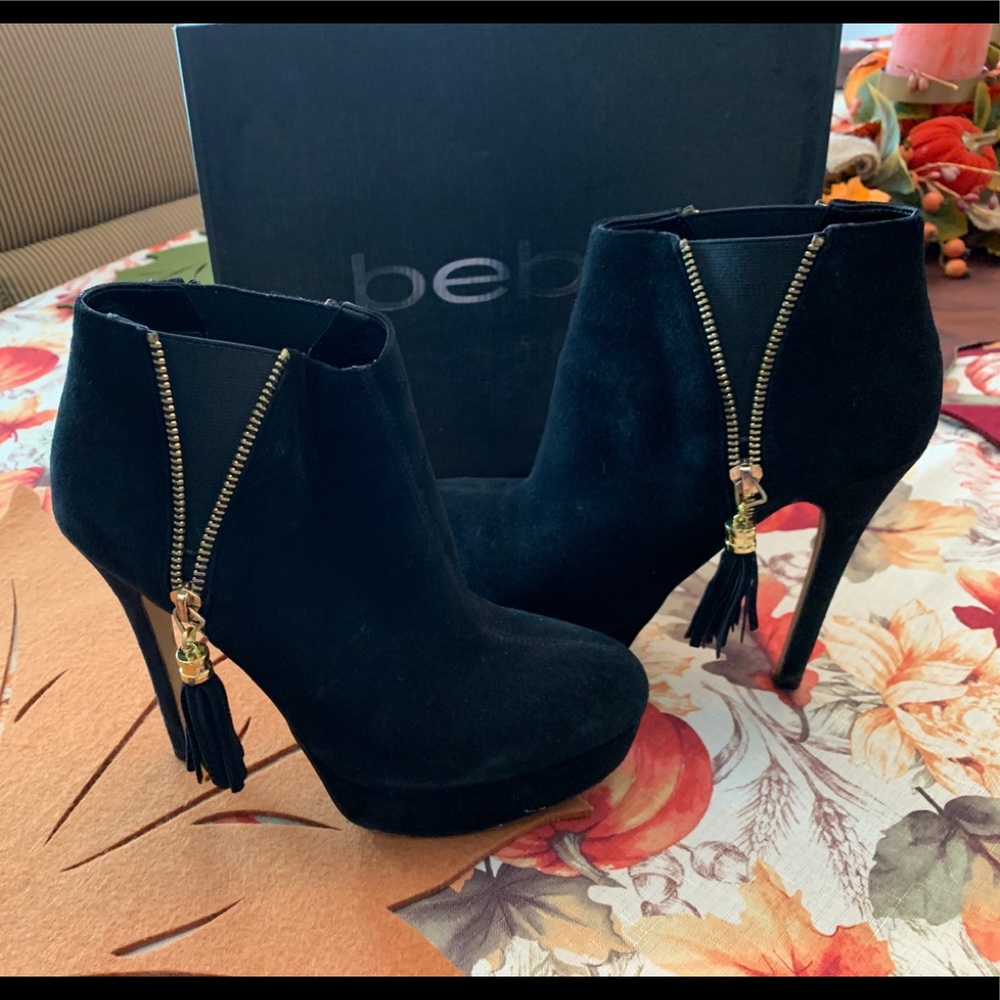 Bebe ankle boot with gold zipper accent